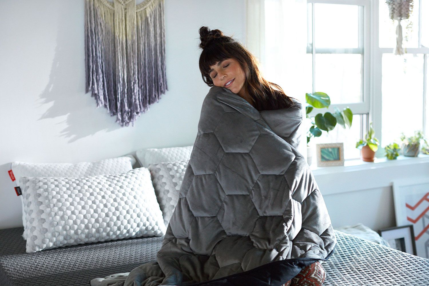 Woman laying on bamboo sheets